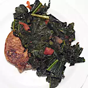 Braciole di maiale col cavolo nero